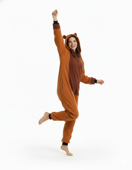 Person wearing a brown bear onesie on a white background