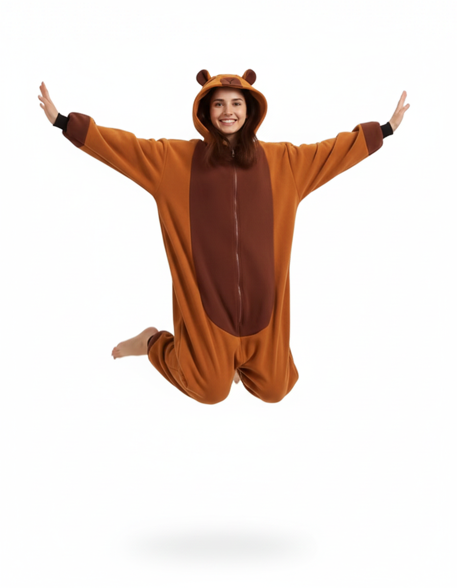 Person wearing a brown bear onesie on a white background