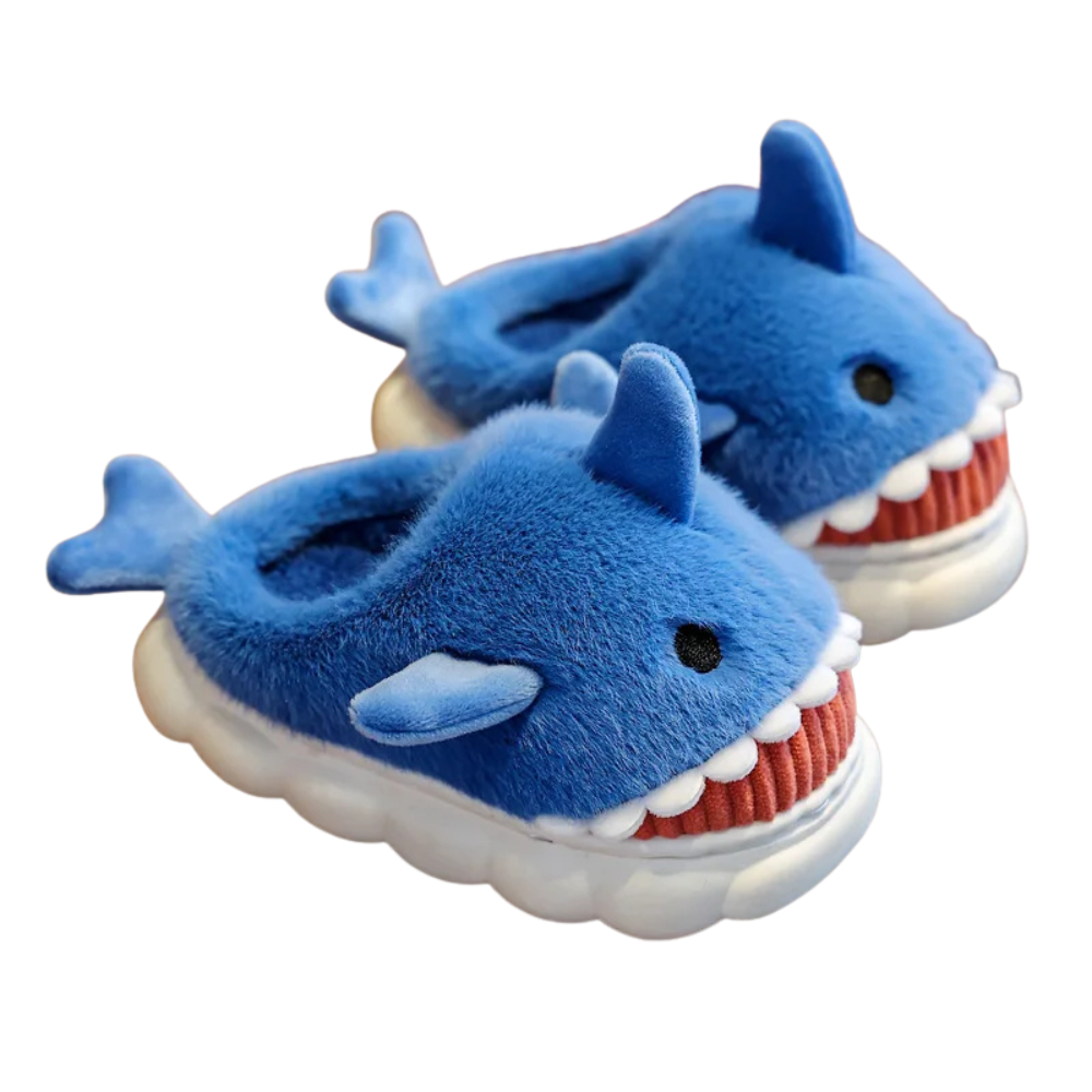 Blue shark-themed slippers on a white background