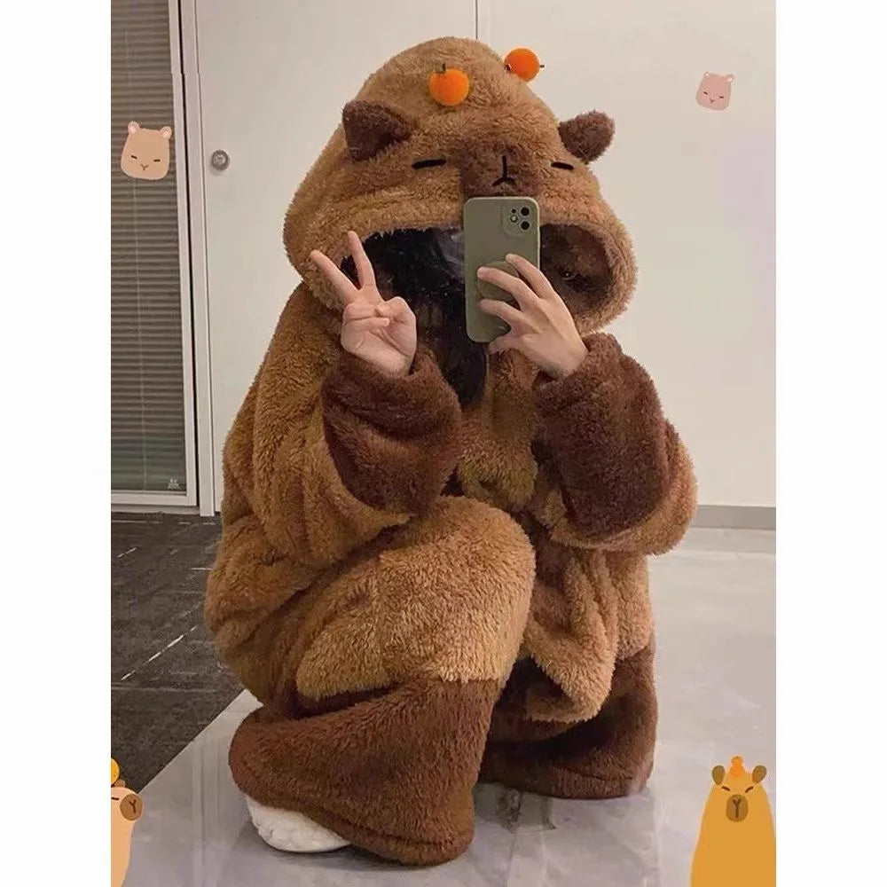Person wearing a brown bear costume taking a selfie.