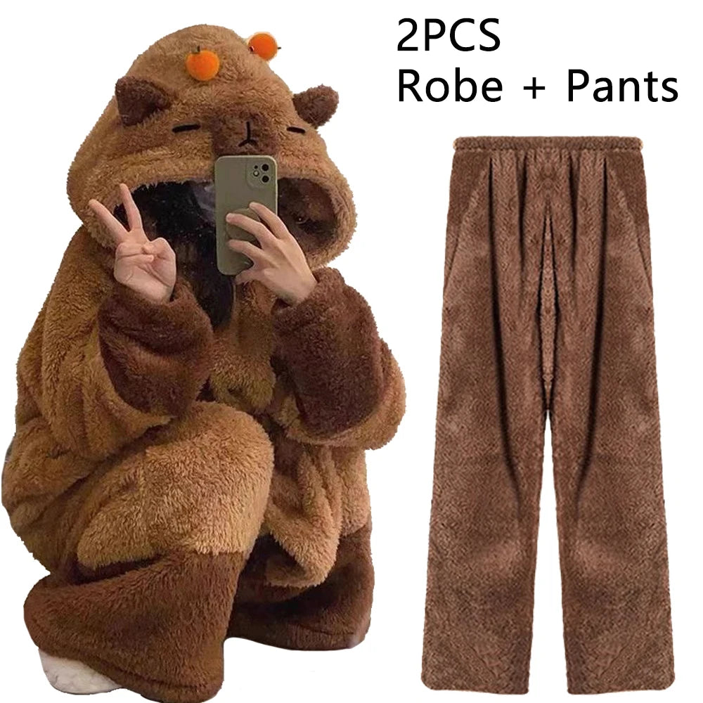 Brown robe and pants set with a person wearing the robe taking a selfie.