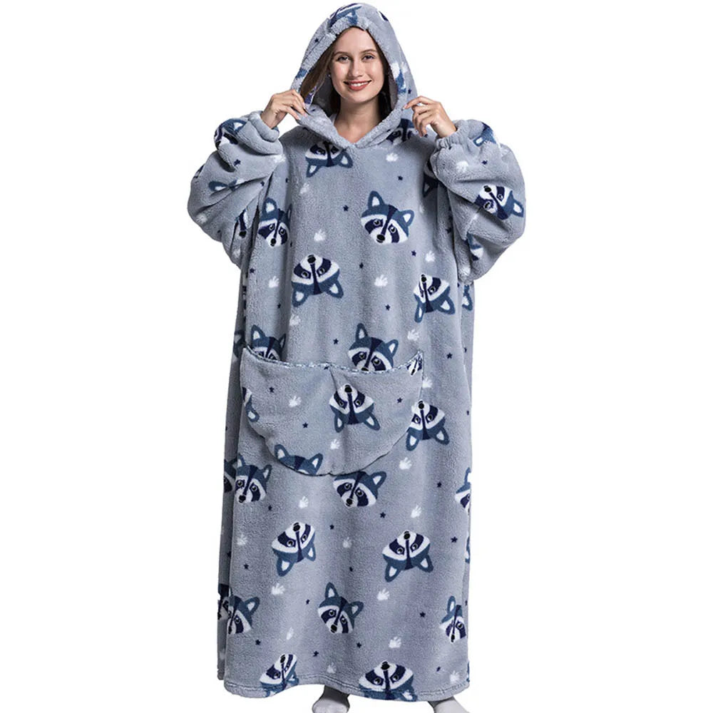 Person wearing a gray hoodie with raccoon patterns on a white background