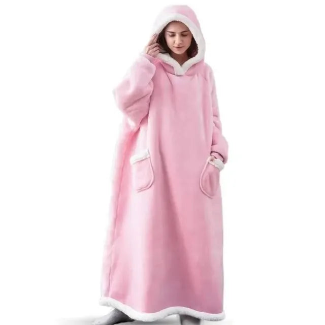 Person wearing a pink hooded blanket on a white background